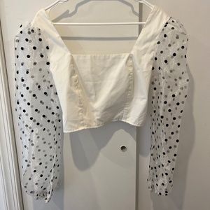 Cropped white top with sheer polka dot sleeves
